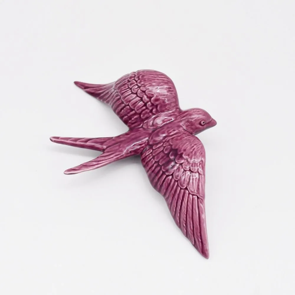 Hirondelle de Caldas da Rainha en céramique mauve